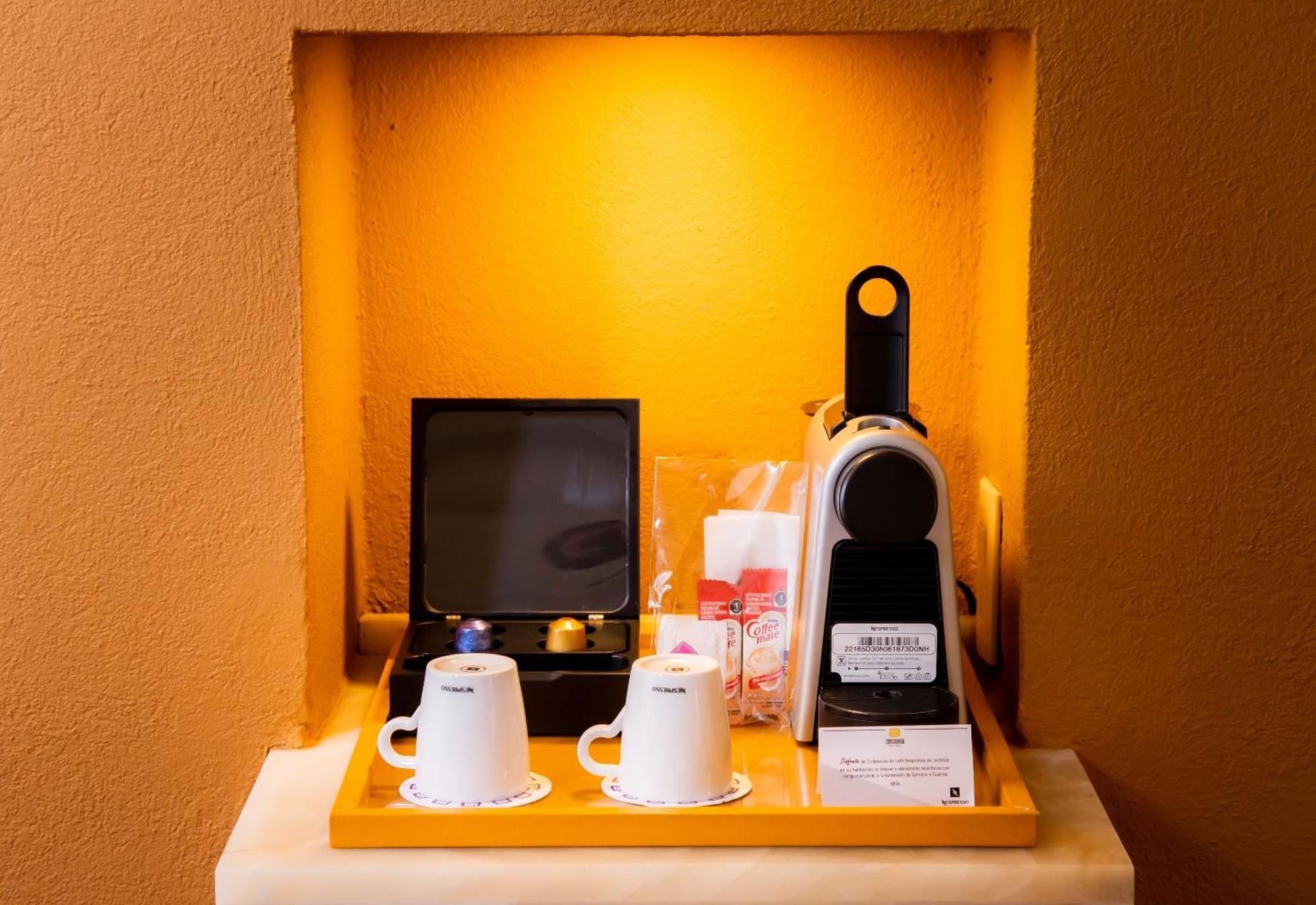 Camino Real Monterrey Hotel San Pedro Garza Garcia Ngoại thất bức ảnh A Nespresso coffee machine in a hotel room
